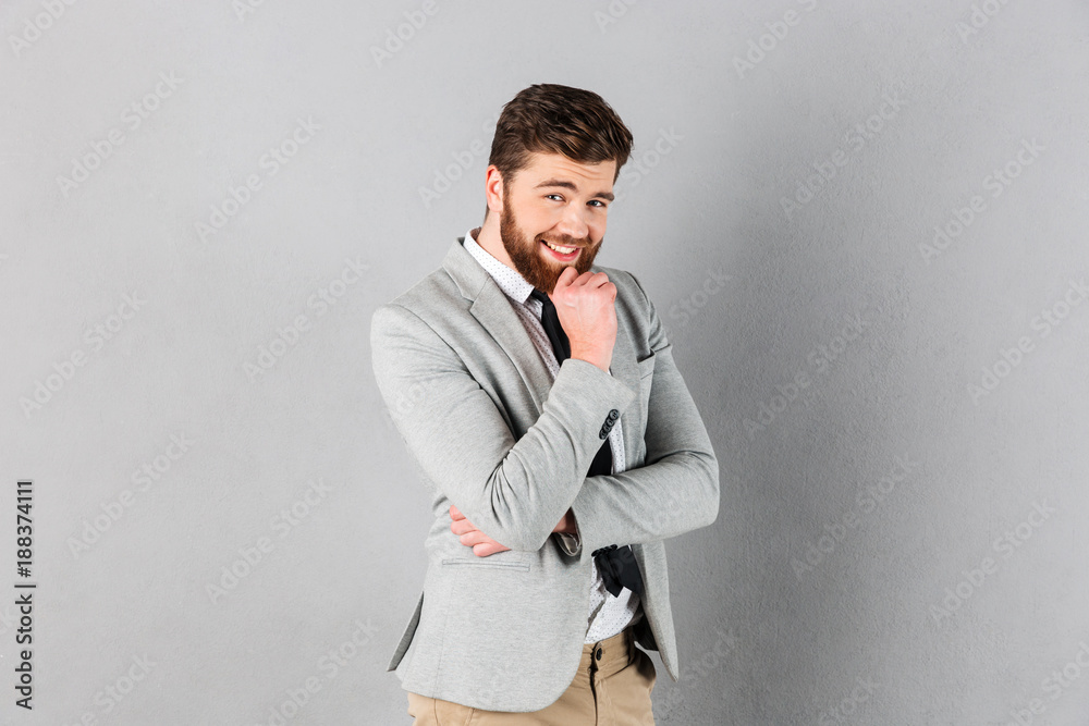 Portrait of a smiling businessman dressed in suit Portrait of a smiling businessman dressed in suit