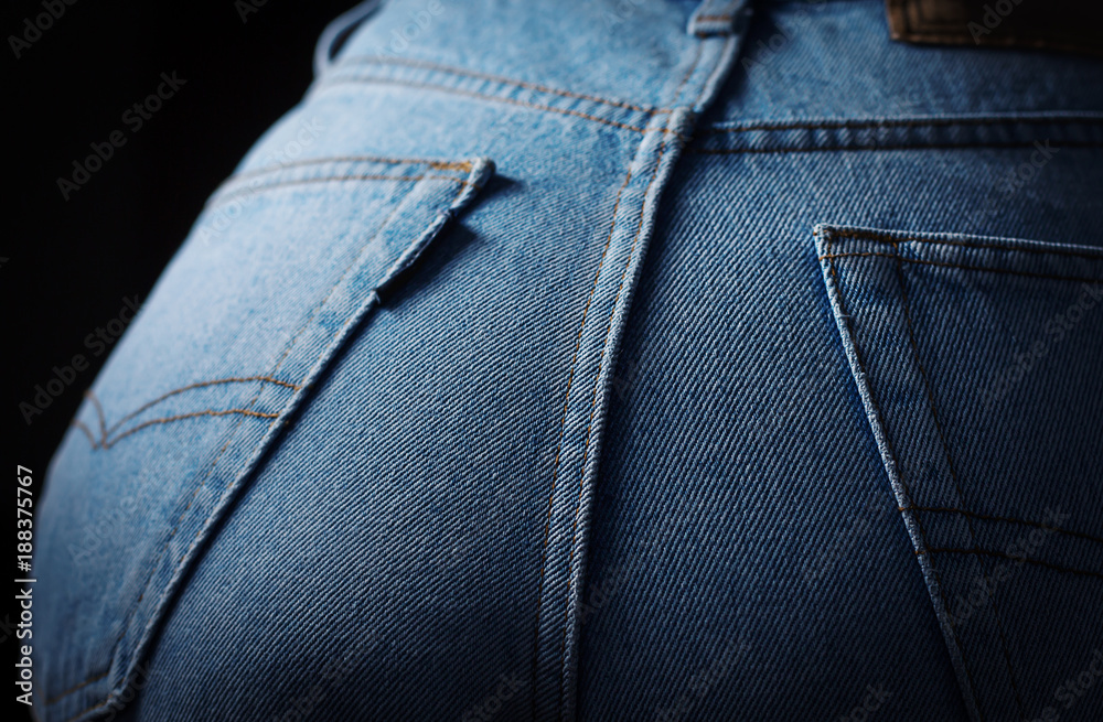 Closeup of female buttocks wearing blue jeans Closeup of female buttocks wearing blue jeans