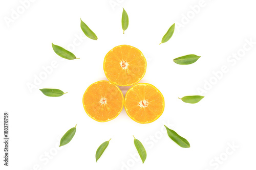 Top view Orange fruit slice and green leaf isolated on white background .