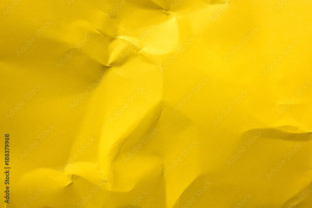 Obraz premium Żółty zmięty papierowy tło