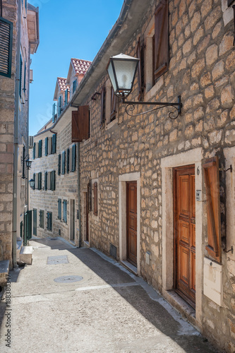 Sunny street in ancient town