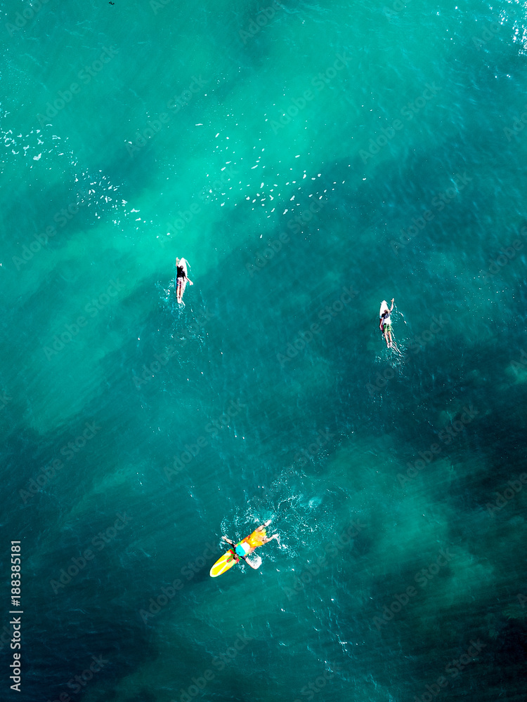 Surfing in Bali. Ocean, waves. Taken from the top.