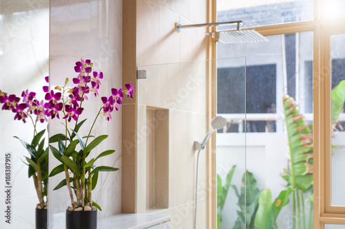 Luxury bathroom features basin  toilet bowl and bathtub