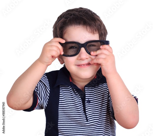 Cute funny little boy wearing sunglasses  isolated on white. Lifestyle  children concept