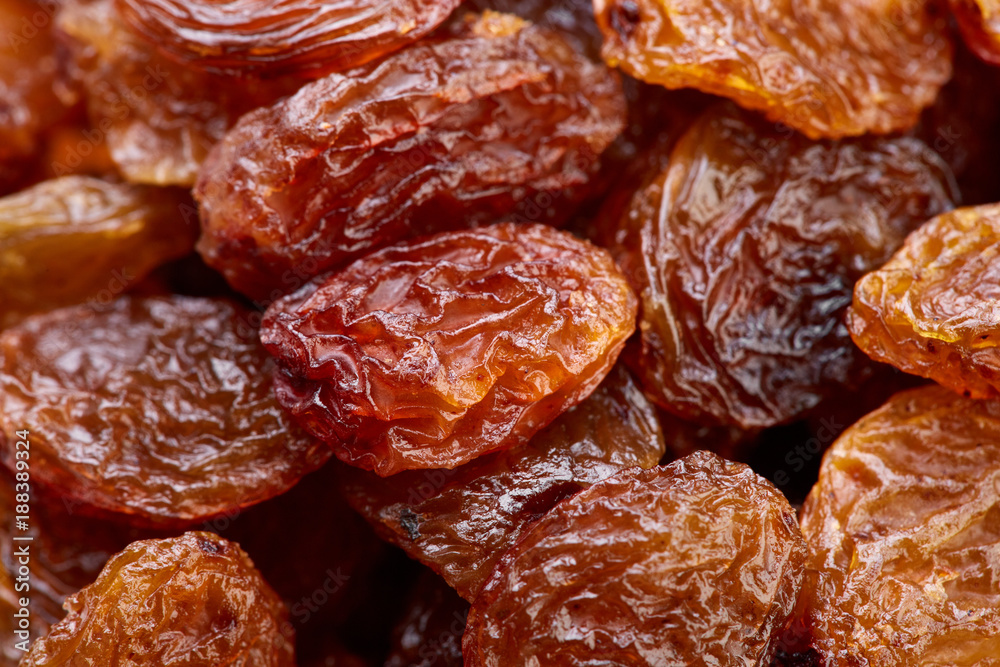 Raisins on a white background. Dried grapes. Raisins on a white background. Dried grapes.