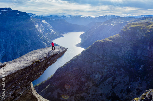 Woman standing on Trolltunga photo