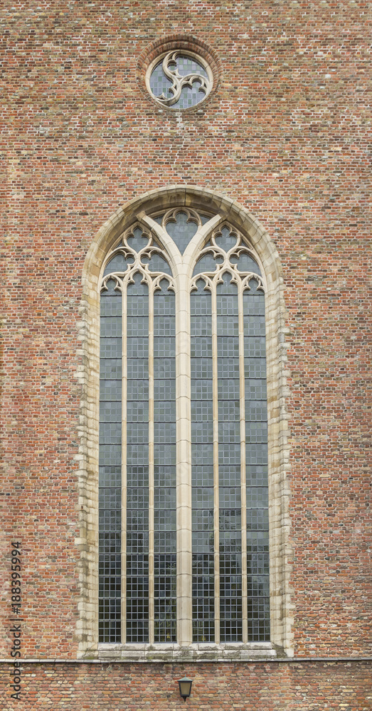church window and brick wall