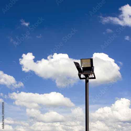 multiple sport light with blue sky and cloudy background