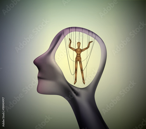 man profile head with marionette inside, manipulate the people concept,