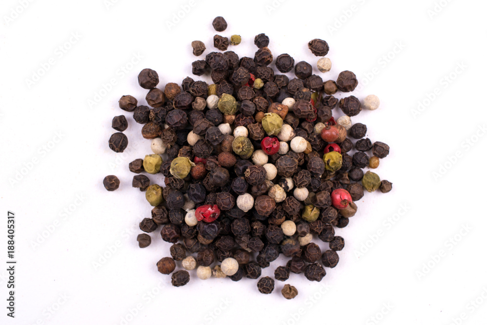 A pile of mix of different Colorful dried peppers balls isolated on white background A pile of mix of different Colorful dried peppers balls isolated on white background