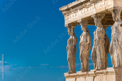 Close up of the Caryatids of the Erechtheion. A caryatid is a sculpted female figure serving as an architectural support taking the place of a column or a pillar supporting an entablature on her head. © Haris Andronos