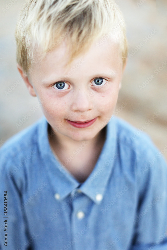 Portrait of young blonde boy looking at camera Portrait of young blonde boy looking at camera