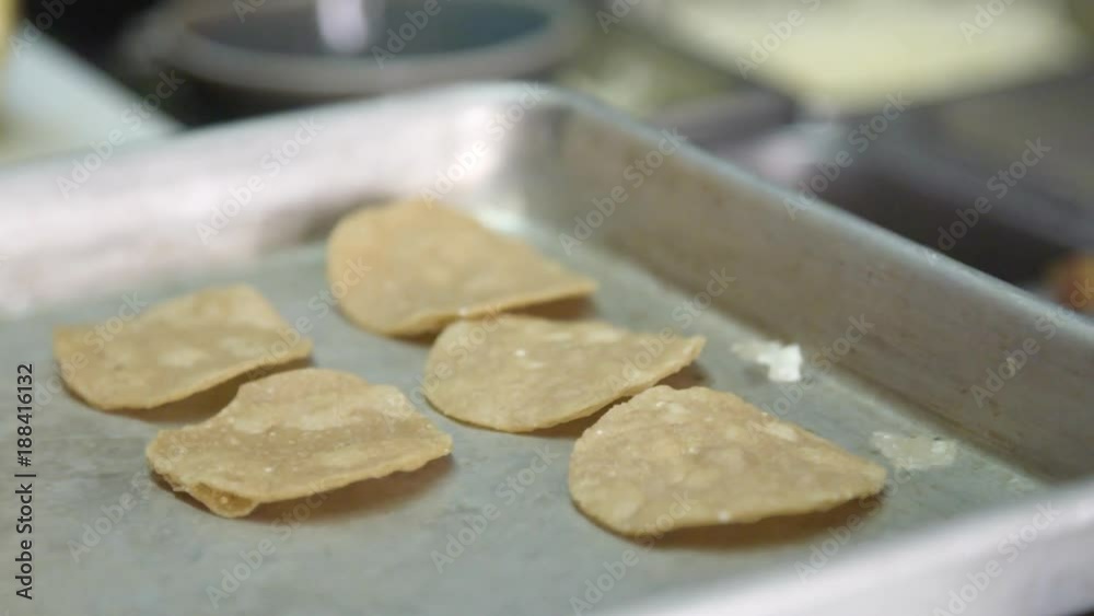 Close up, tortilla chips on pan Close up, tortilla chips on pan