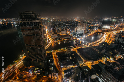 Night cityscape of Ho Chi Minh City from the high of Bitexco tower. Traffic trails on street.