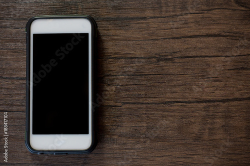 Smartphone on wooden table