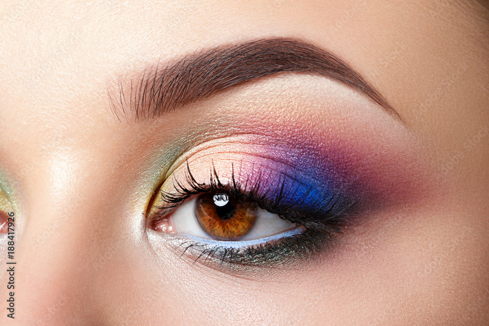 Naklejka premium Closeup view of woman eye with evening makeup