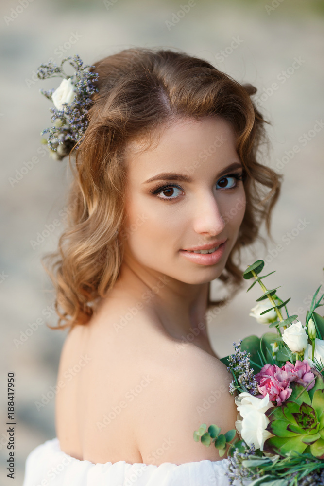 Portrait of a young beautiful tender bride