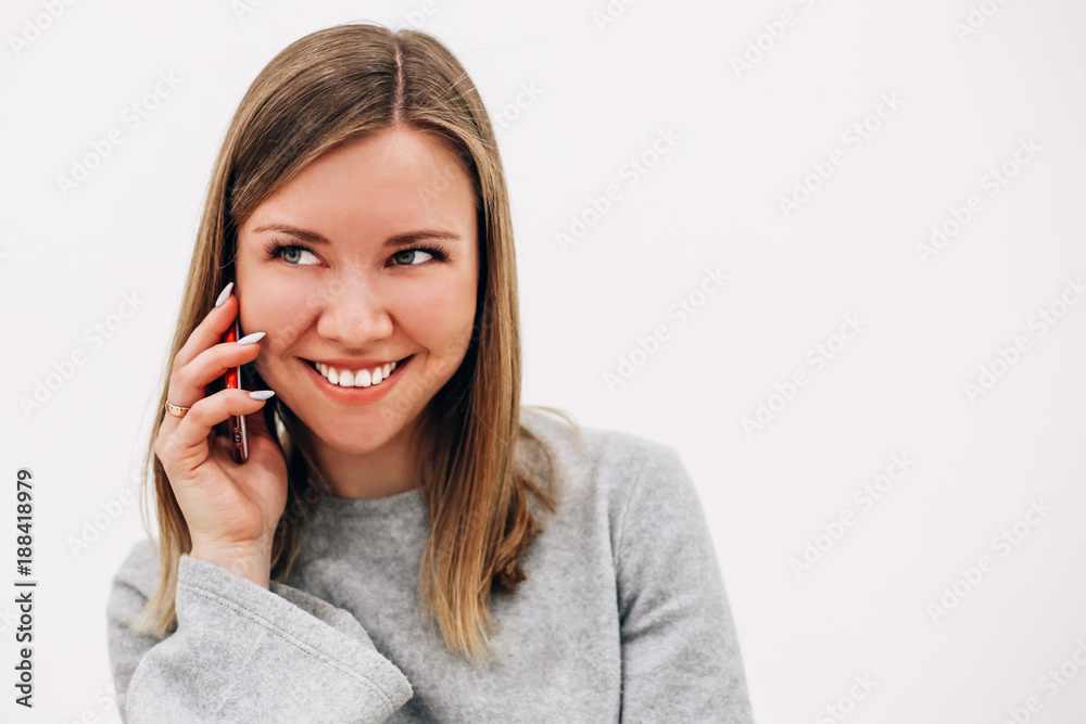 Portrait of young beautiful girl talking on the phone Portrait of young beautiful girl talking on the phone