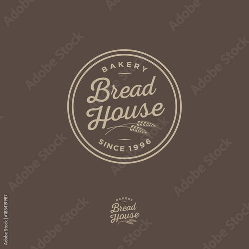 Bakery logo. Bread Shop emblem. Lettering and spikelet in a circular badge.