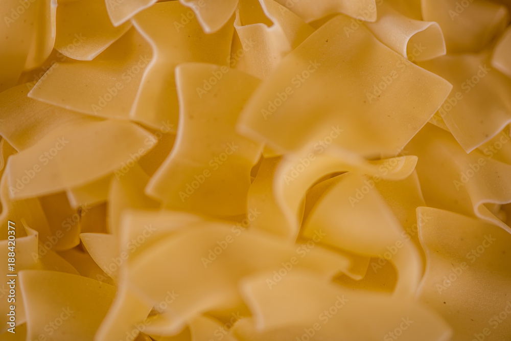 close up detail macro of square shape dry durum wheat pasta close up detail macro of square shape dry durum wheat pasta