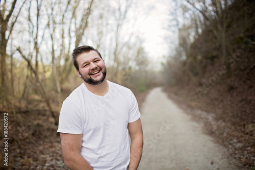 Happy young man smiling