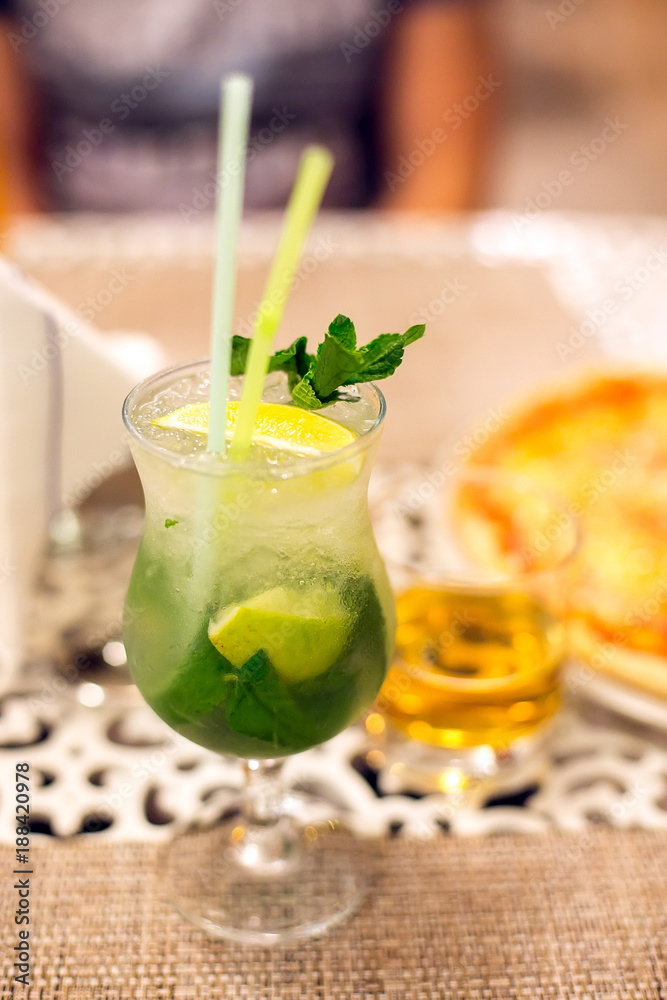 Fresh Mojito cocktail with lime and mint Fresh Mojito cocktail with lime and mint