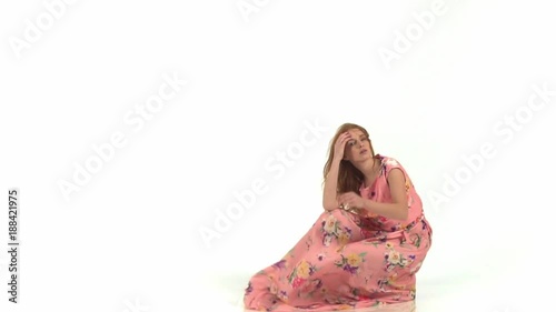 Fashion model in flying pink dress. Slow motion photo