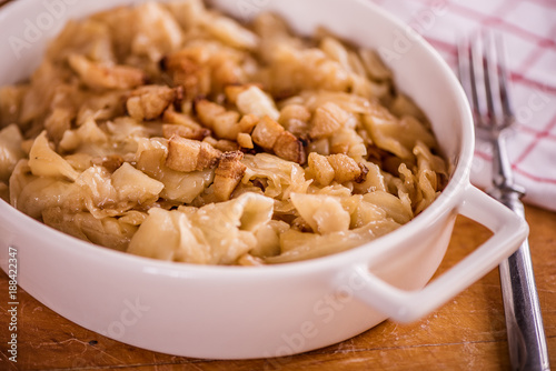 square pasta shape dish with cabbage and bacon traditional in central eastern europe  © Lumistudio