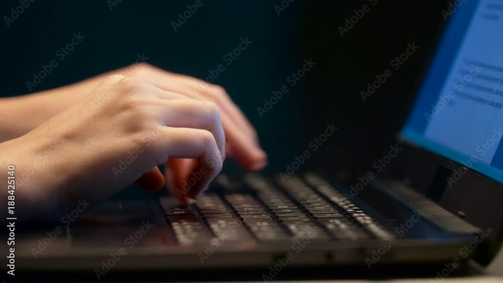 close up of female hands with laptop typing close up of female hands with laptop typing