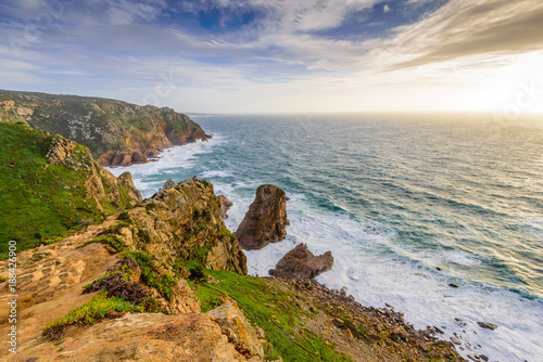 The rocky coast of the Atlantic ocean. Cape ROCA - the westernmost point of Europe, a popular tourist destination, Portugal.