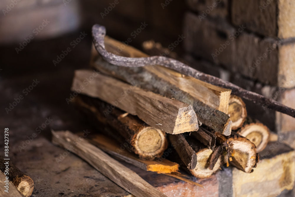 stone fireplace with firewood without fire, winter stone fireplace with firewood without fire, winter