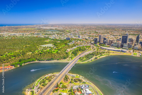 Aerial view of Perth City in Australia. Scenic flight over Narrows Bridge, Swan River, Kings Park, Mill Point, Perth Convention and Exhibition Center in Western Australia. Copy space.