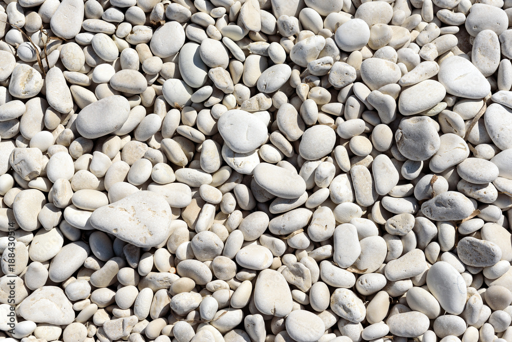 Background image of pebbles on a beach. Background image of pebbles on a beach.