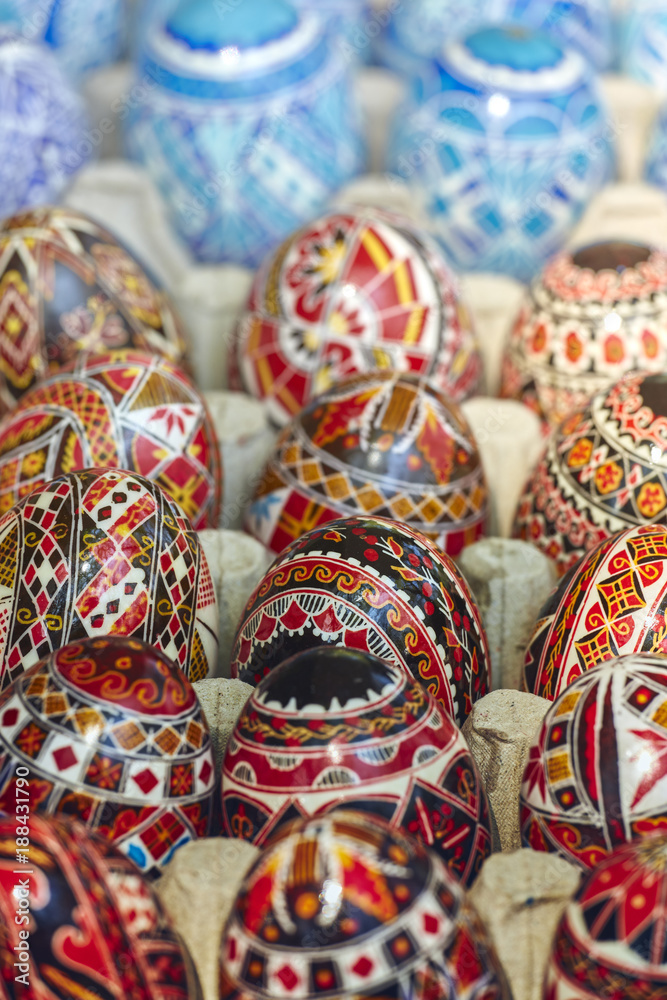 Beautiful colorful homemade ornate, painted decorative Easter eggs. Closeup, shallow depth of field, selective focus.