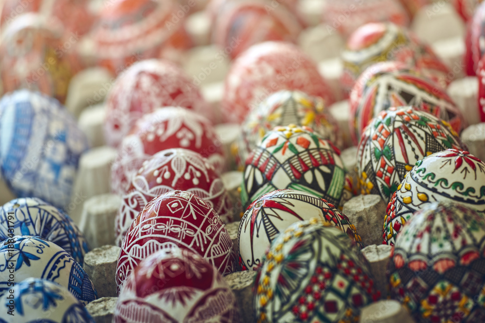 Beautiful colorful homemade ornate, painted decorative Easter eggs. Closeup, shallow depth of field, selective focus.