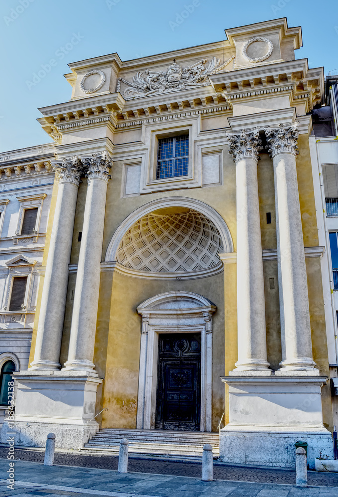 A yellow and white church with columns in Parma in Italy. HDR effect.