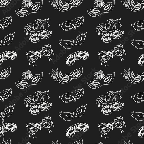 Hand drawn doodle carnival masks seamless pattern