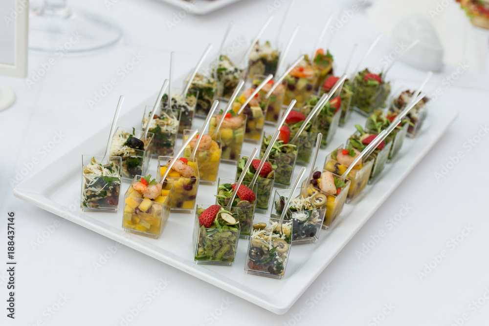 Fresh snack salads on picnic.