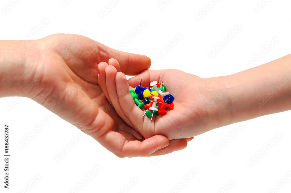 hand holding pins for note paper on white background hand holding pins for note paper on white background