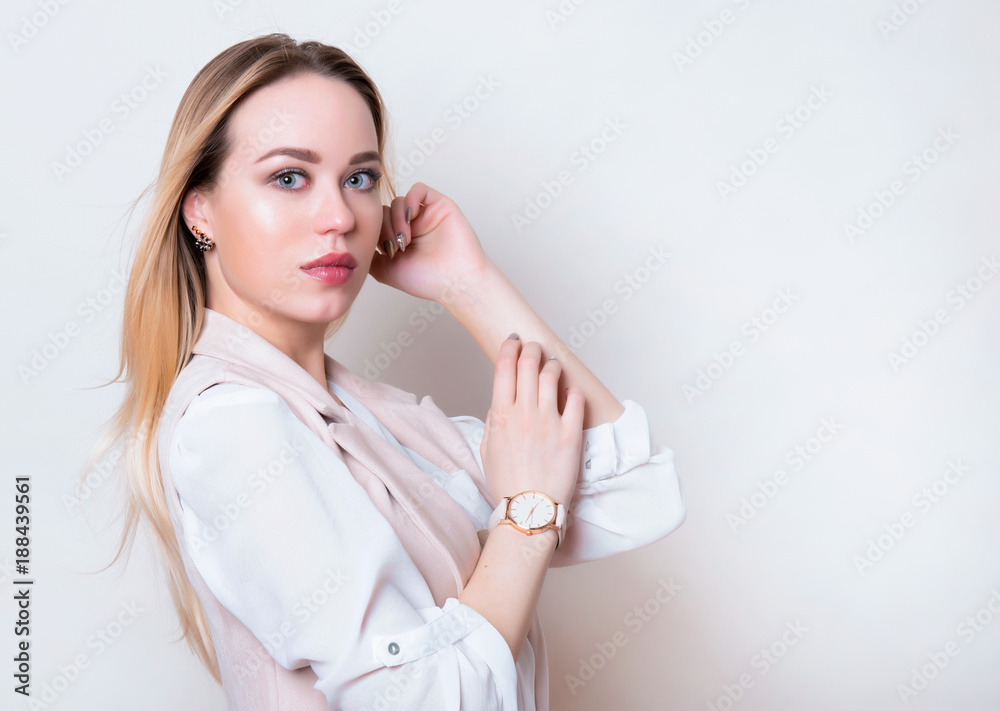 beautiful young woman with long hair wearing wrist watch beautiful young woman with long hair wearing wrist watch