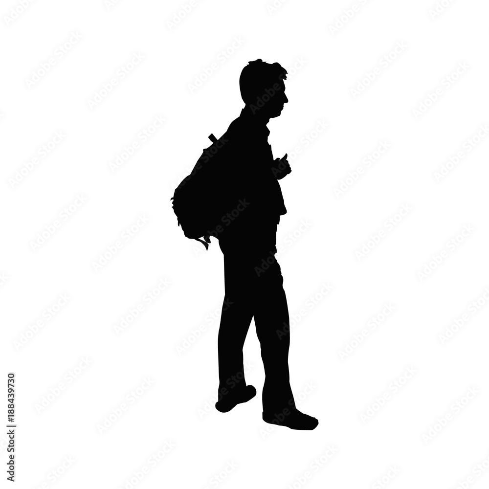 Silhouette of young man with backpack.