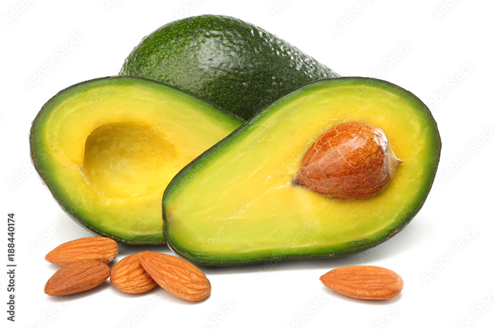 healthy food. sliced avocado with almonds isolated on white background healthy food. sliced avocado with almonds isolated on white background