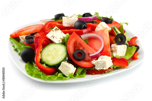 Square plate of greek salad isolated on white. fresh vegetable salad