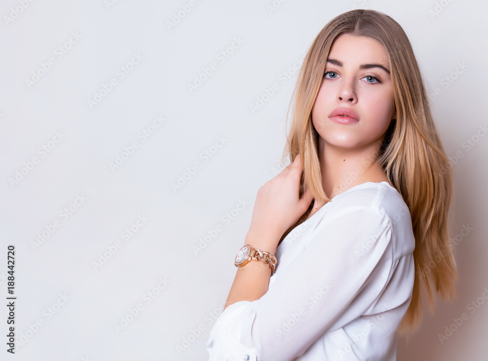 beautiful young woman with long hair wearing wrist watch beautiful young woman with long hair wearing wrist watch