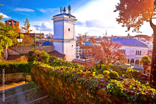 Town of Udine landmarks view with red sun haze