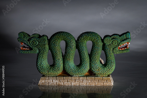 Obraz na płótnie Indigenous cultures and native american tribe heritage concept with an Aztec double headed serpent or snake that is believed to represent the Quetzalcoatl god known as the feathered serpent w salonie