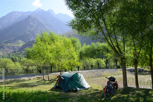 Camping in the Wakhan valley with Afghanistan in the background, Pamir Mountain Range, Tajikistan