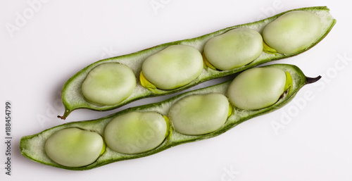 fresh broad beans on a white background