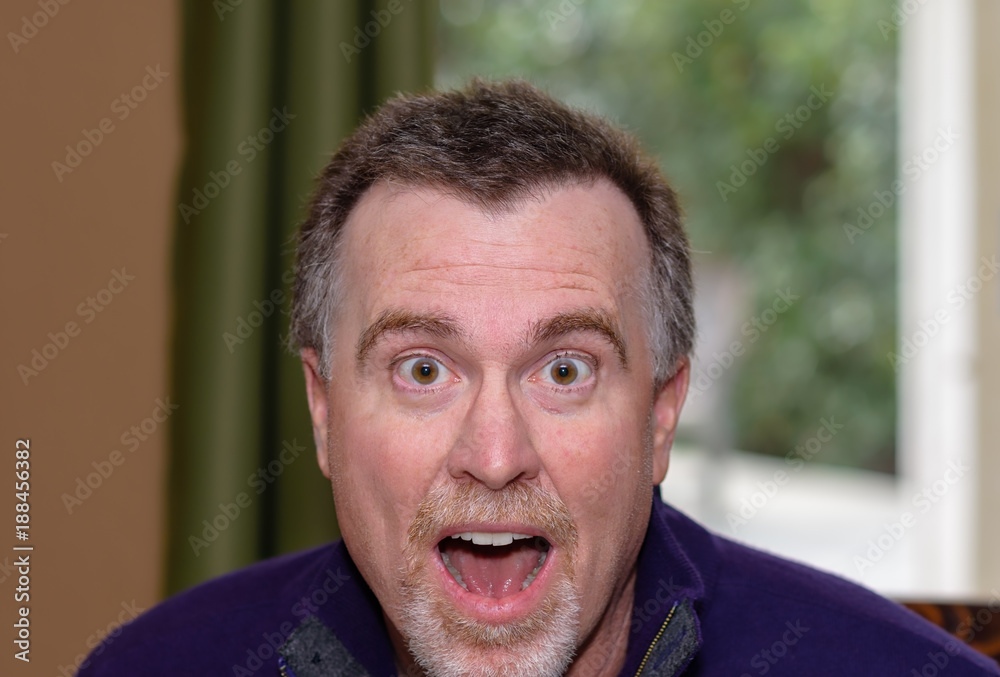 Fototapeta premium Adult male showing emotion in portrait