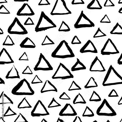 Vector abstract hand drawn seamless triangle pattern. Black and white doodle universal background made with watercolor, ink and marker. Trendy scandinavian design for fashion textile print.